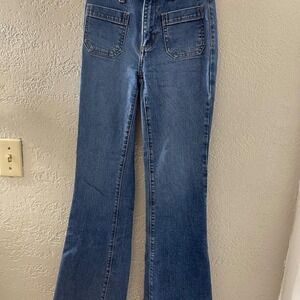 A New Day blue denim jeans high rise with a flared leg Size 00R